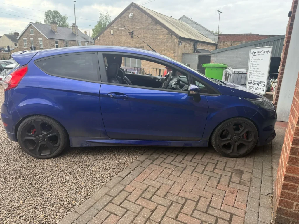 Modified Blue Ford Fiesta ST at Star Garage Mansfield
