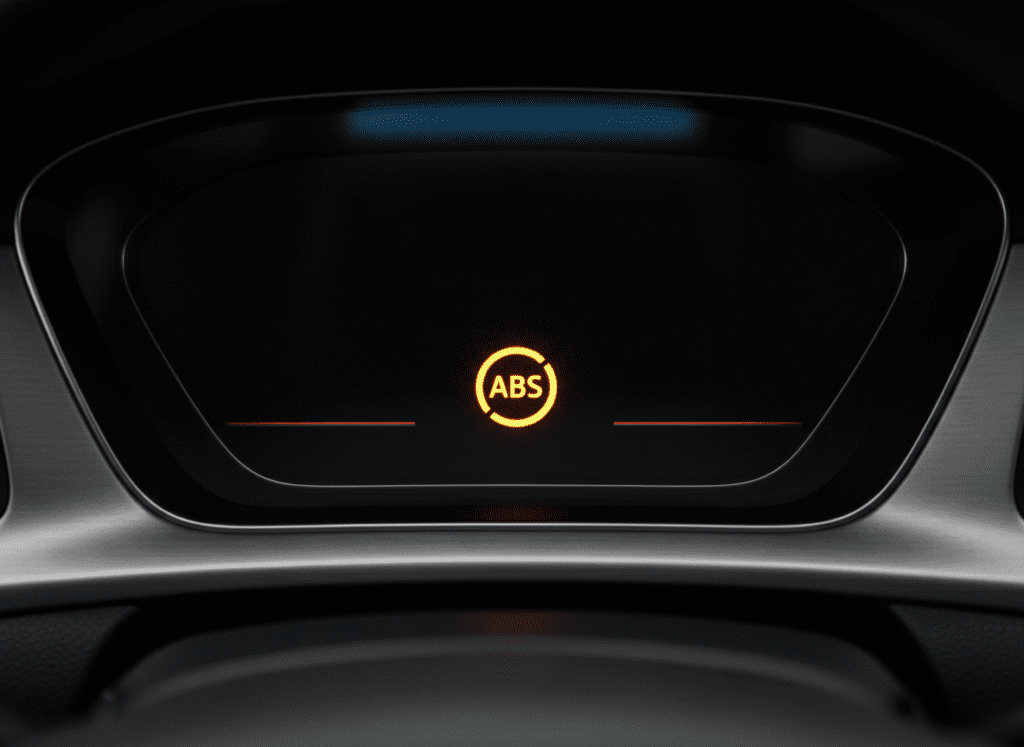 Amber ABS warning light illuminated on car dashboard