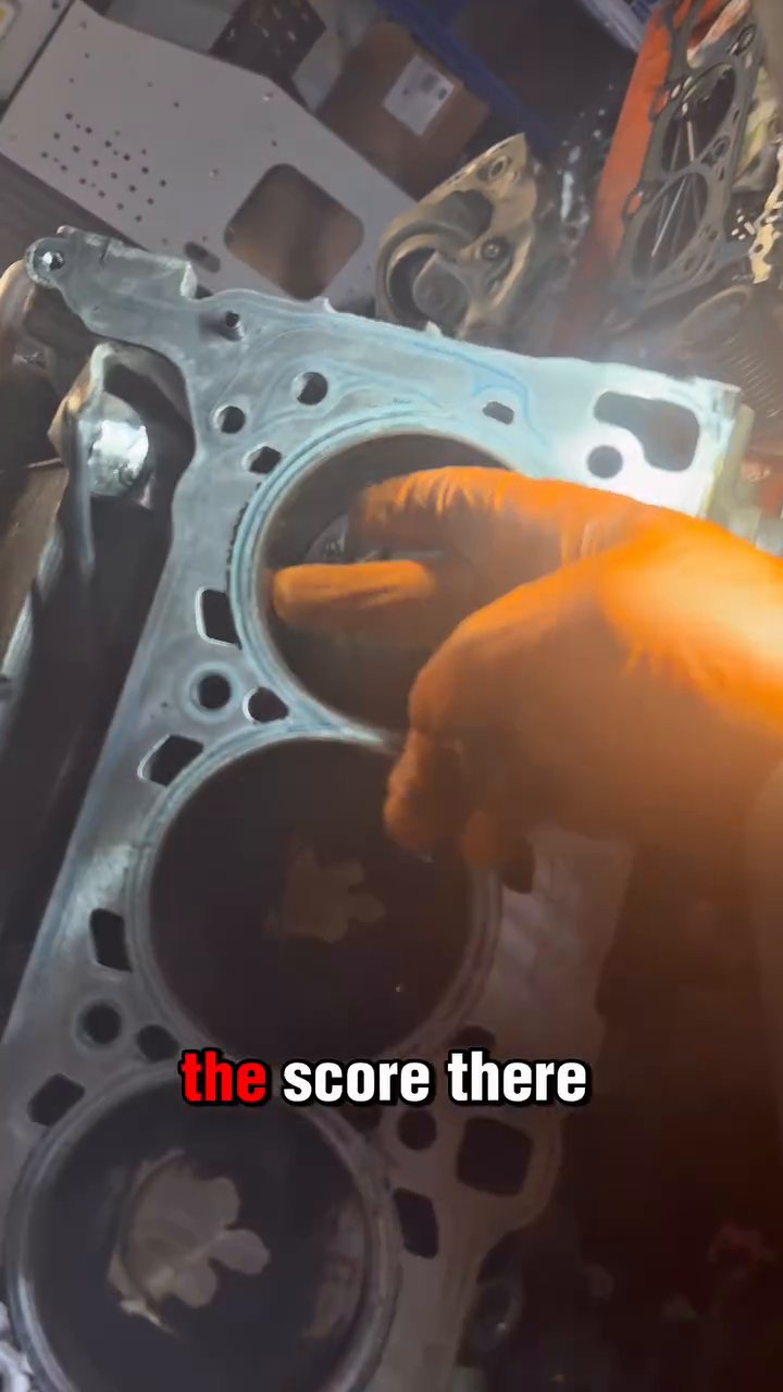 Porsche Cayenne cylinder head removed showing cylinder bores during engine knock diagnosis